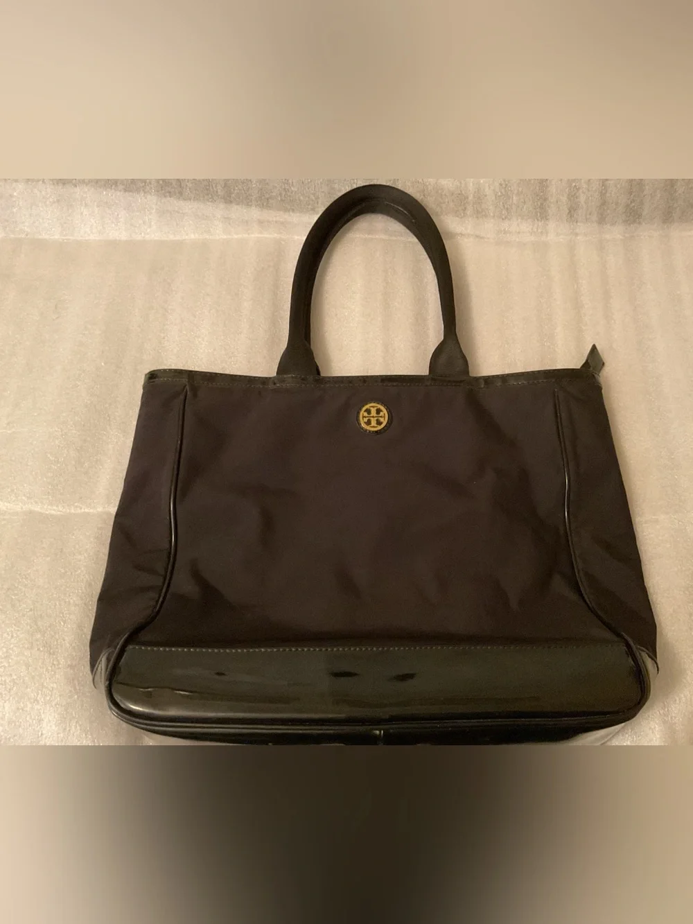 Tory Burch nylon functional presentation